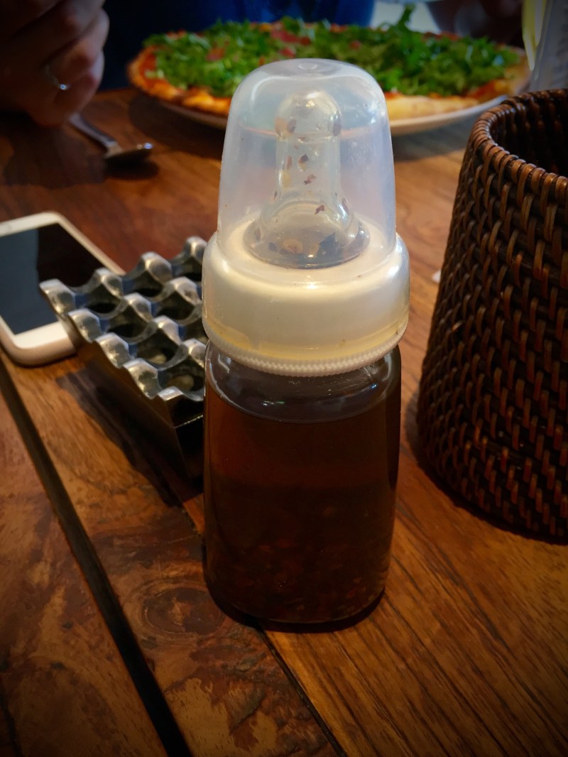 Chili oil in a baby bottle