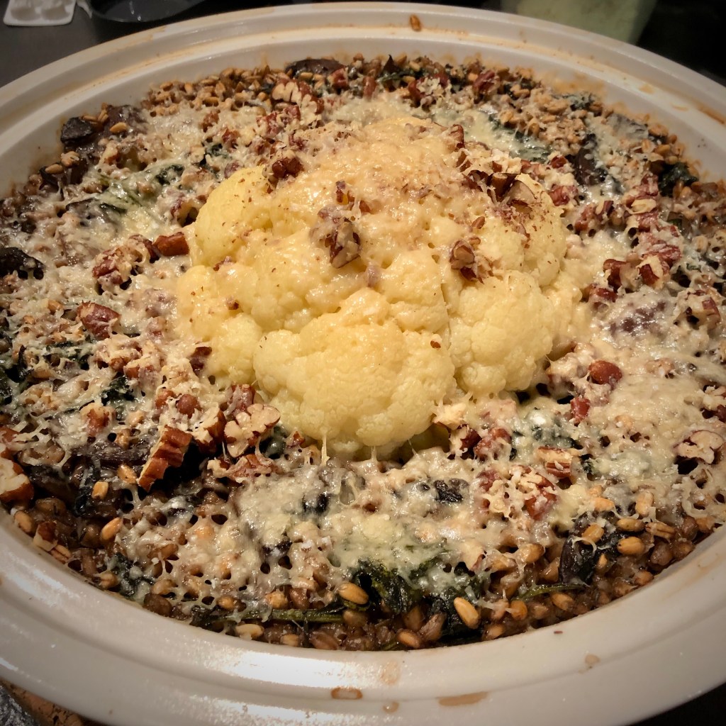 Whole roasted Cauliflower with Spelt, Shallots and Mushrooms